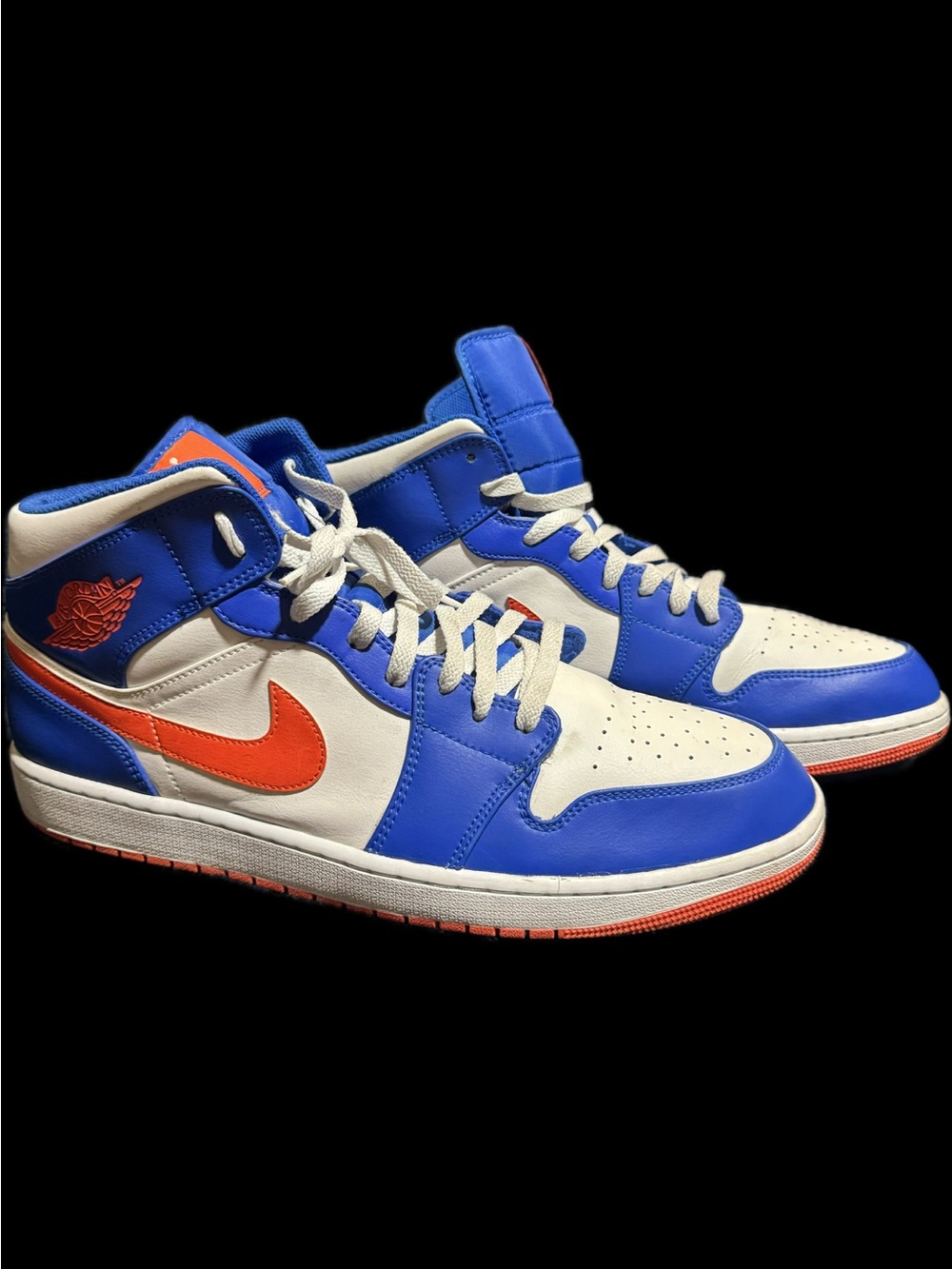 Air Jordan 1 Mid “Wheaties”/“Knicks” — the blue, white, and orange colorway.